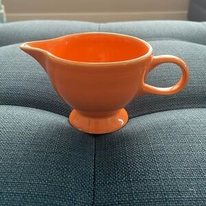 Vintage Fiestaware Orange Creamer approximately 4”
